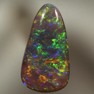 SOLID BLACK OPAL Bright sparkles of red and orange with green and blue